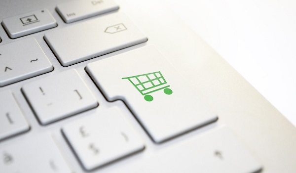 Afbeelding van een toetsenbord en een winkelwagentje voor Veelgestelde vragen over het online winkelen - Glasdon